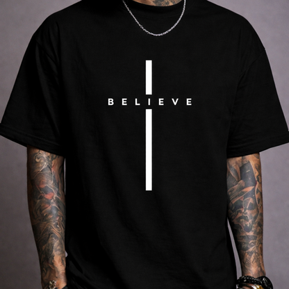 Oversized black t-shirt with minimalist ‘BELIEVE’ cross design, modern Christian streetwear